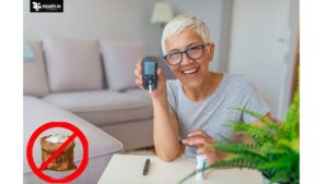 Lady holding a blood sugar tester, focusing on how to balance blood sugar levels naturally.