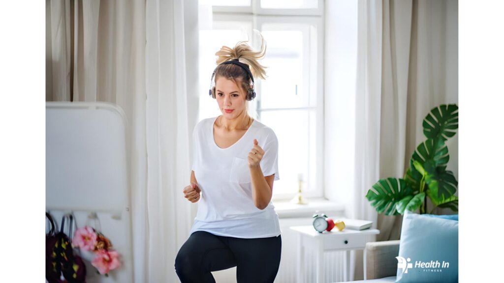 Woman doing cardio exercises at home for full-body strength and heart health.