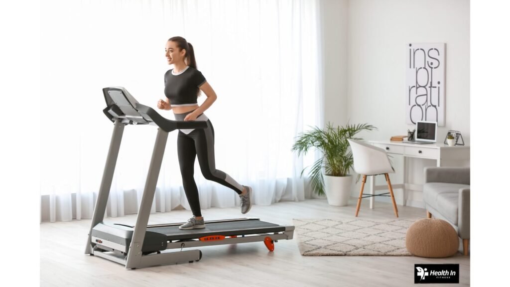 Woman running on a treadmill at home, staying motivated in her fitness journey."