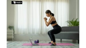 A woman exercising in a fitness center, symbolizing the benefits of gyms for physical and mental health