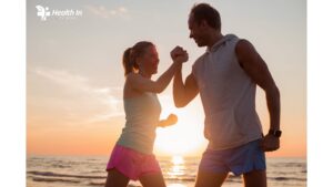 A man and woman walking on the beach, symbolizing a balanced lifestyle and the pursuit of wellness in 2024."