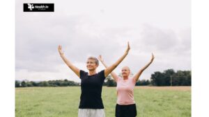 An older man and woman exercising outdoors, showcasing the benefits of exercise for all ages.