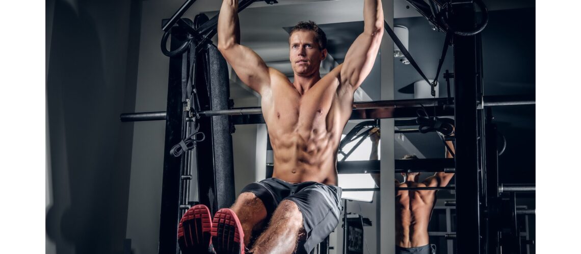 A man working out at the gym, showcasing dedication to gym workouts for improved strength and fitness."